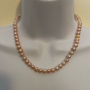 beautiful, artificial pearl necklace and bracelet
